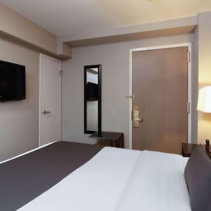Kamer met een Queen Size Bed